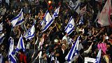 Israelis opposed to PM Benjamin Netanyahu's judicial overhaul plan block a highway during a protest after the leader fired his defence minister, in Tel Aviv, March 26, 2023