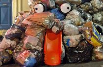 Street artist Bisk is turning trash into art during the pension protests in France