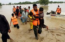 Army troops evacuate people from a flood-hit area in Punjab, Pakistan, last summer.