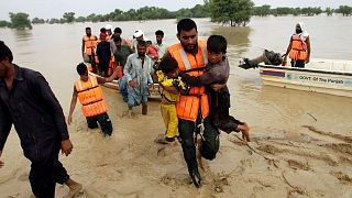 Army troops evacuate people from a flood-hit area in Punjab, Pakistan, last summer.