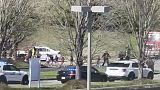 Law enforcement officers lead children away from the scene of a shooting at The Covenant School, a private Christian school in Nashville, Tenn., on Monday.