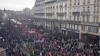 People march during a demonstration Tuesday, March 28, 2023 in Paris. Protests are taking place in France on Tuesday.