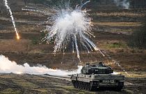 A Leopard 2 tank is seen in action at the Field Marshal Rommel Barracks in Augustdorf, Germany, Wednesday, Feb. 1, 2023.