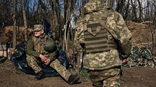 Ukrainian soldiers of the 28th brigade guard their position close to Bakhmut, Donetsk region, Ukraine, Monday, March 27, 2023. 