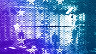 The European flag at the European Parliament building in Strasbourg and a surveillance camera