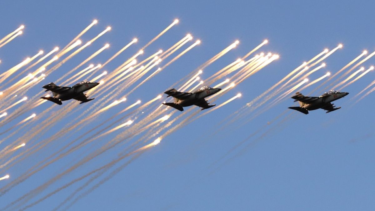 Belarusian army Su-25 jet fighters fly during a parade marking Independence Day in Minsk, Belarus, Wednesday, July 3, 2019.