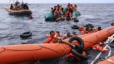 Migrants being rescued by a Sea Watch-3 team, around 35 miles away from Libya in Libyan SAR zone, Oct. 18, 2021. 