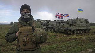 An Ukrainian soldier takes part in a military exercise at a military training camp in an undisclosed location in England