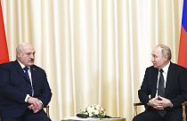 Russian President Vladimir Putin, right, and Belarusian President Alexander Lukashenko talk at a meeting in Russia in February, 2023.