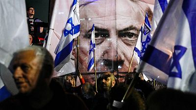 Israelis protest against plans by Prime Minister Benjamin Netanyahu's government to overhaul the Israel's judicial system, in Tel Aviv, Israel.