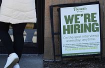 A hiring sign is displayed at a restaurant in Mount Prospect, Ill., March 19, 2023.