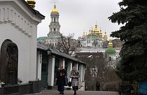 People walk in the Monastery of the Caves, also known as Kyiv-Pechersk Lavra in Kyiv, Ukraine, March 23, 2023
