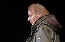 French novelist and poet Michel Houellebecq arrives at a reading of his latest book in Cologne, Germany, Monday, Jan. 19, 2015.
