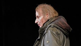French novelist and poet Michel Houellebecq arrives at a reading of his latest book in Cologne, Germany, Monday, Jan. 19, 2015.