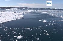 FILE - Sea ice ear the Ilulissat Icefjord by Disko Bay on the western coast of Greenland, May 2022