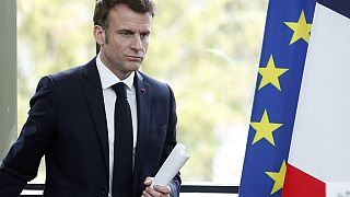 French President Emmanuel Macron arrives to deliver a speech in Sainte-Savine-Le-Lac, southeastern France, Thursday, March 30, 2023.