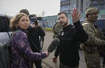 Ukrainian President Volodymyr Zelenskyy gestures as he speaks to Julie Pace, senior vice president and executive editor of The Associated Press, in Okhtyrka, 28 March 2023