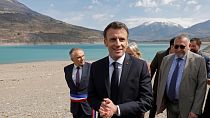 French President Emmanuel Macron speaks to journalists upon his arrival in Sainte-Savine-Le-Lac, southeastern France.