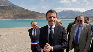 French President Emmanuel Macron speaks to journalists upon his arrival in Sainte-Savine-Le-Lac, southeastern France.