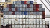 FILE - Shipping containers aboard a cargo ship at port of Southampton, southern England, Jan. 1, 2021. 
