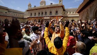 Devotees sing and dance to celebrate Ramnavmi festival, celebrated as the birthday of Hindu god Rama, in Ayodhya, India, March 30, 2023