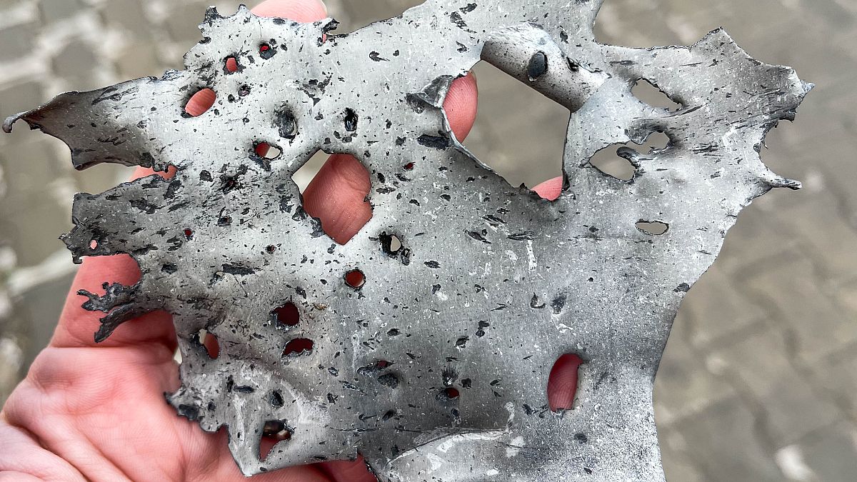 The metal fragment found at a bus stop hit by a missile demonstrates the destructive power of such missiles