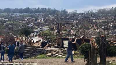 People survey storm damage in the Walnut Vallery area of west Little Rock