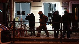 Russische Ermittler arbeiten nach einer Explosion in einem Café in St. Petersburg, 2. April 2023