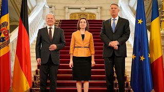 از چپ به راست: صدراعظم آلمان، رئیس جمهوری مولداوی و رئیس جمهوری رومانی