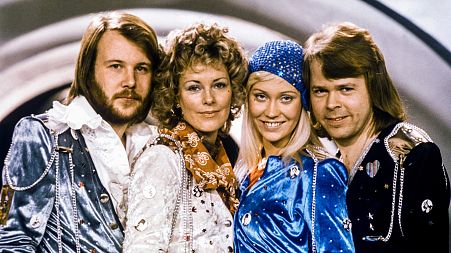 Benny Andersson, Anni-Frid Lyngstad, Agnetha Faltskog and Bjorn Ulvaeus posing after winning the Swedish branch of the Eurovision Song Contest with their song "Waterloo".