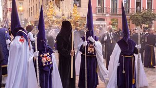 Antonio Daniel Mira (wearing a black tunic) during the procession of Jesús El Rico. 