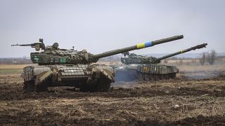 Ukrainian army tanks exercise as soldiers check the readiness of equipment for combat deployment, at a military base in Zaporizhzhia region, Ukraine, in April.