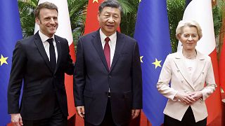 China's President Xi Jinping, center, his French counterpart Emmanuel Macron, left, and European Commission President Ursula von der Leyen meet in Beijing, April 6, 2023.