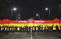 A mural on the peace gates at Lanark Way In Belfast celebrates 25 years since the Good Friday Agreement