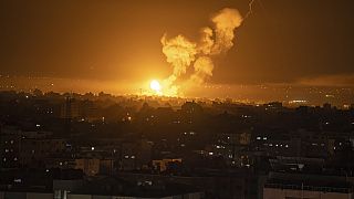 Fire and smoke rise following an Israeli airstrike in central Gaza Strip, Friday, April 7, 2023. 