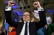National Coalition Chairman Petteri Orpo celebrates at the party's parliament election wake after seeing the results of the advance votes in Helsinki, Finland, Sunday, April 2