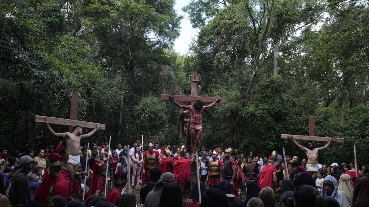 Faithful reenact the Way of the Cross in Atyra, Paraguay Friday, April 7, 2023. 