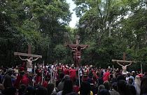 Faithful reenact the Way of the Cross in Atyra, Paraguay Friday, April 7, 2023.