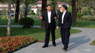 Hszi Csin-ping kínai és Emmanuel Macron francia elnök Kantonban