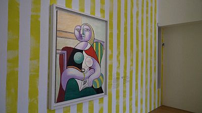 Pablo Picasso exhibition room with stripes designed by Paul Smith at the Musée National Picasso-Paris. 