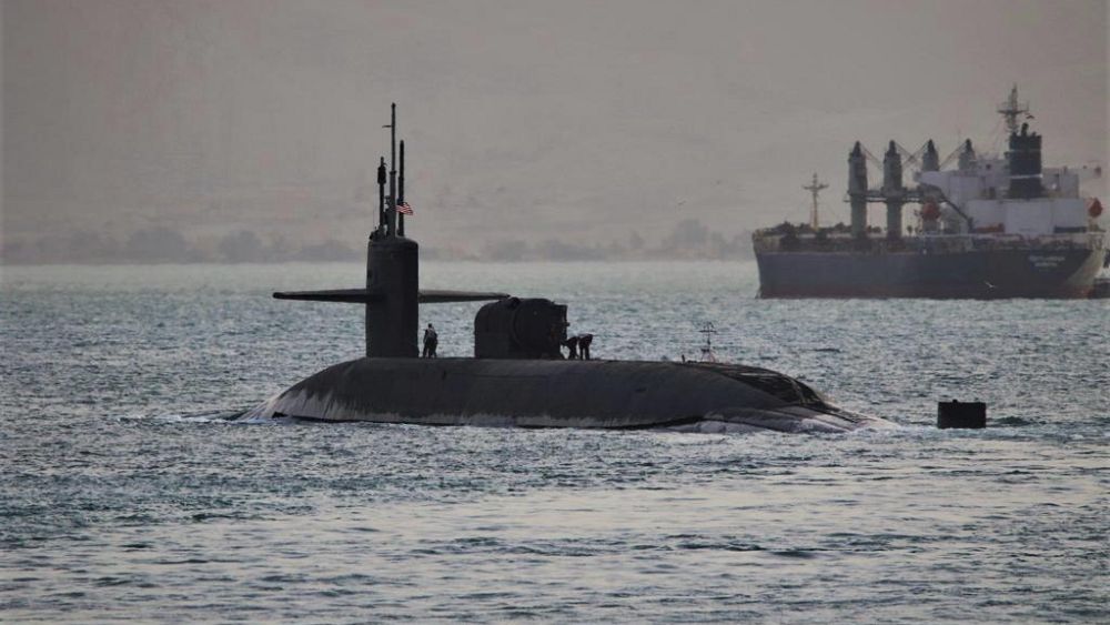 Deploys nuclear-powered submarine with cruise missiles in Strait of Hormuz