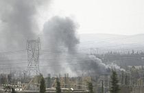 Archive- La fumée monte dans la campagne de Damas, en Syrie, samedi 30 octobre 2021, suite à ce que les médias d'État syriens ont qualifié de frappe aérienne israélienne