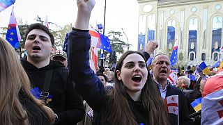 Demonstrators shout slogans during a rally organized by Georgian opposition parties in support of the country's membership in the European Union.