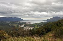 FILE - Warrenpoint village on the banks of Carlingford Lough has a ferry service that connects Northern Ireland, left of photo, with the Republic of Ireland, right.