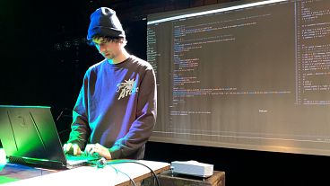 Francesco Corvi prepares on stage before the opening concert at Grrrnd Zero in Vaulx-en-Velin, Saturday 8 April