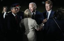 President Joe Biden is greeted by British PM Rishi Sunak as he steps off Air Force One at Belfast International Airport in Belfast, Northern Ireland,  April 11, 2023.