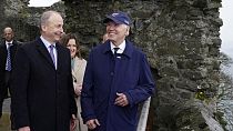 US President Joe Biden stands with Micheál Martin, Tánaiste of Ireland, as they tour Carlingford Castle in County Louth, Ireland