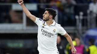 Real Madrid's Marco Asensio celebrates after scoring his side's second goal during the Champions League quarterfinal, first leg, football match against Real Madrid.