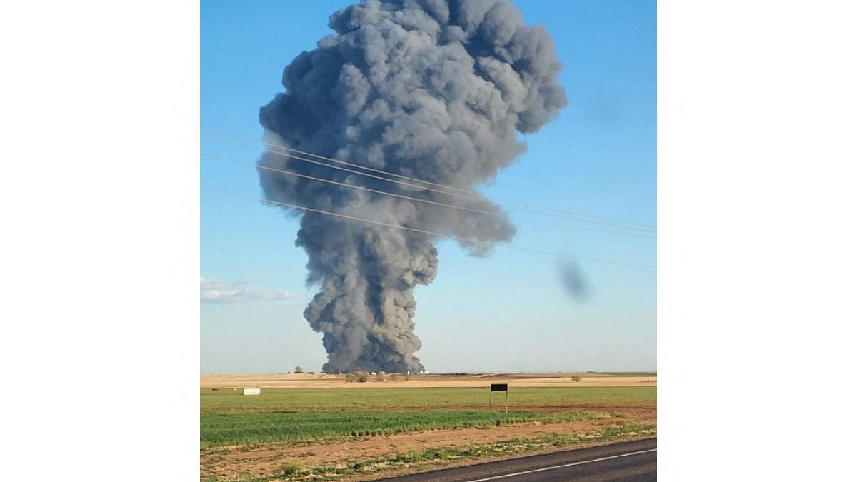 A plume of smoke rising from the farm in Texas.