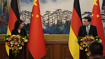 German Foreign Minister Annalena Baerbock, left, and Chinese Foreign Minister Qin Gang attend a joint press conference at the Diaoyutai State Guesthouse in Beijing.